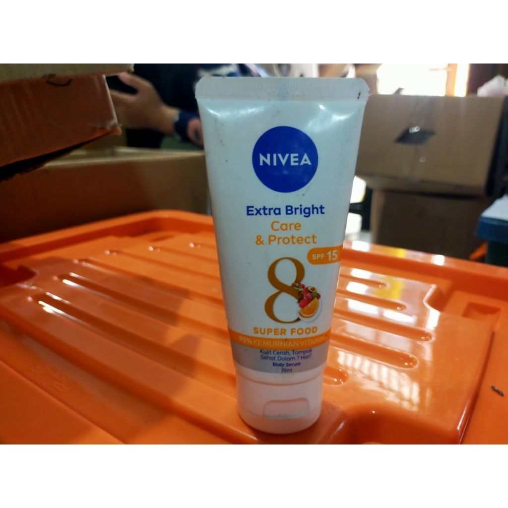 Nivea Extra Bright Care & Protect SPF 15 70ml REJECT KEMASAN