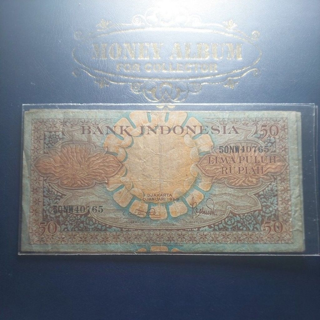 50 rupiah seri bunga kondisi very fine.