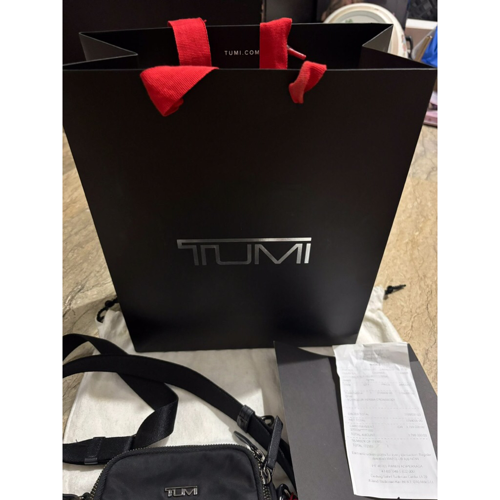 preloved tumi bag