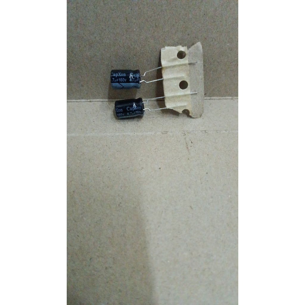 7059 kapasitor elco 4.7uf 4,7uf 4.7 4,7 uf 160v capxon korea