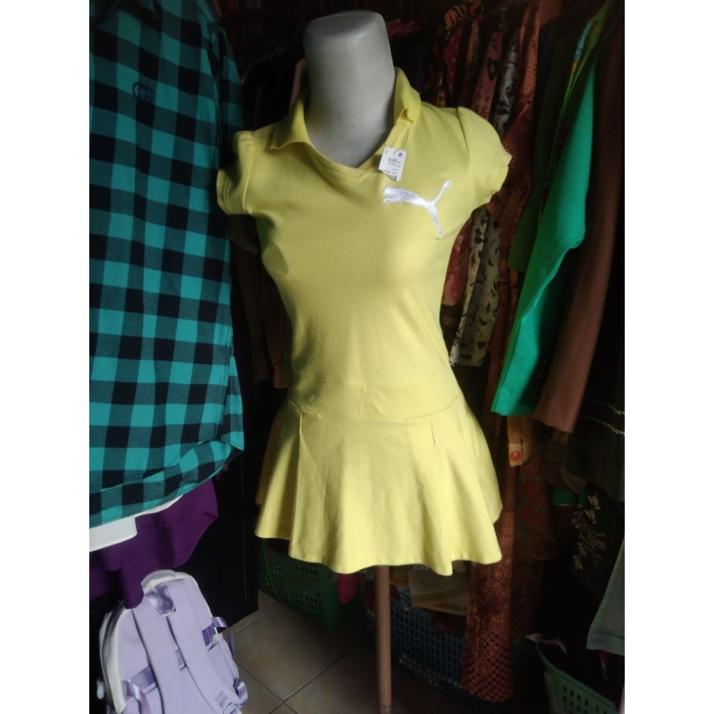 baju olahraga wanita kuning ori