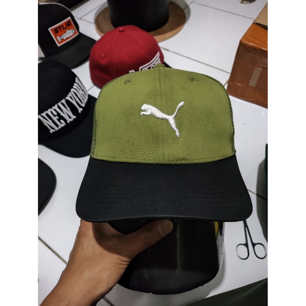 Puma* Topi puma* jaring kucing loncat