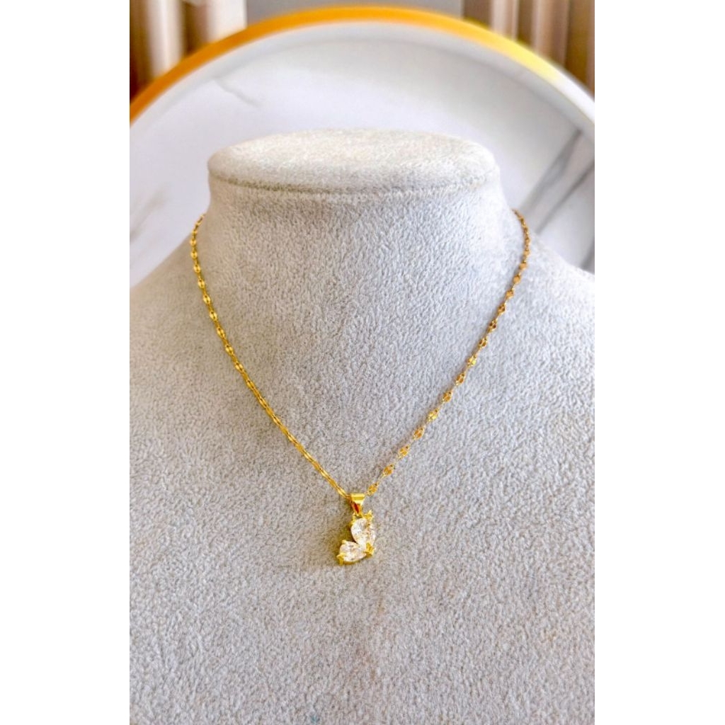 KALUNG LIONTIN MATA TITANIUM GOLD