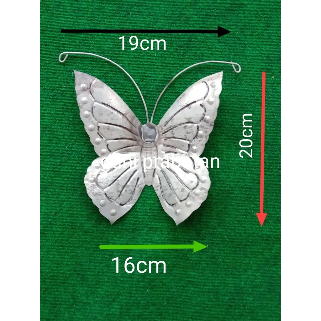 ornamen aksesoris pagar besi, motif kupu kupu.