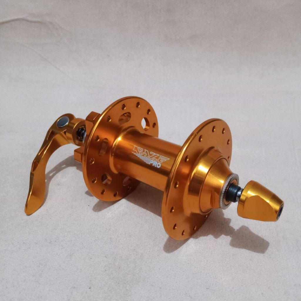 Hub Depan Raze Pro 28 Hole Warna Gold – Bearing Halus untuk MTB Roadbike