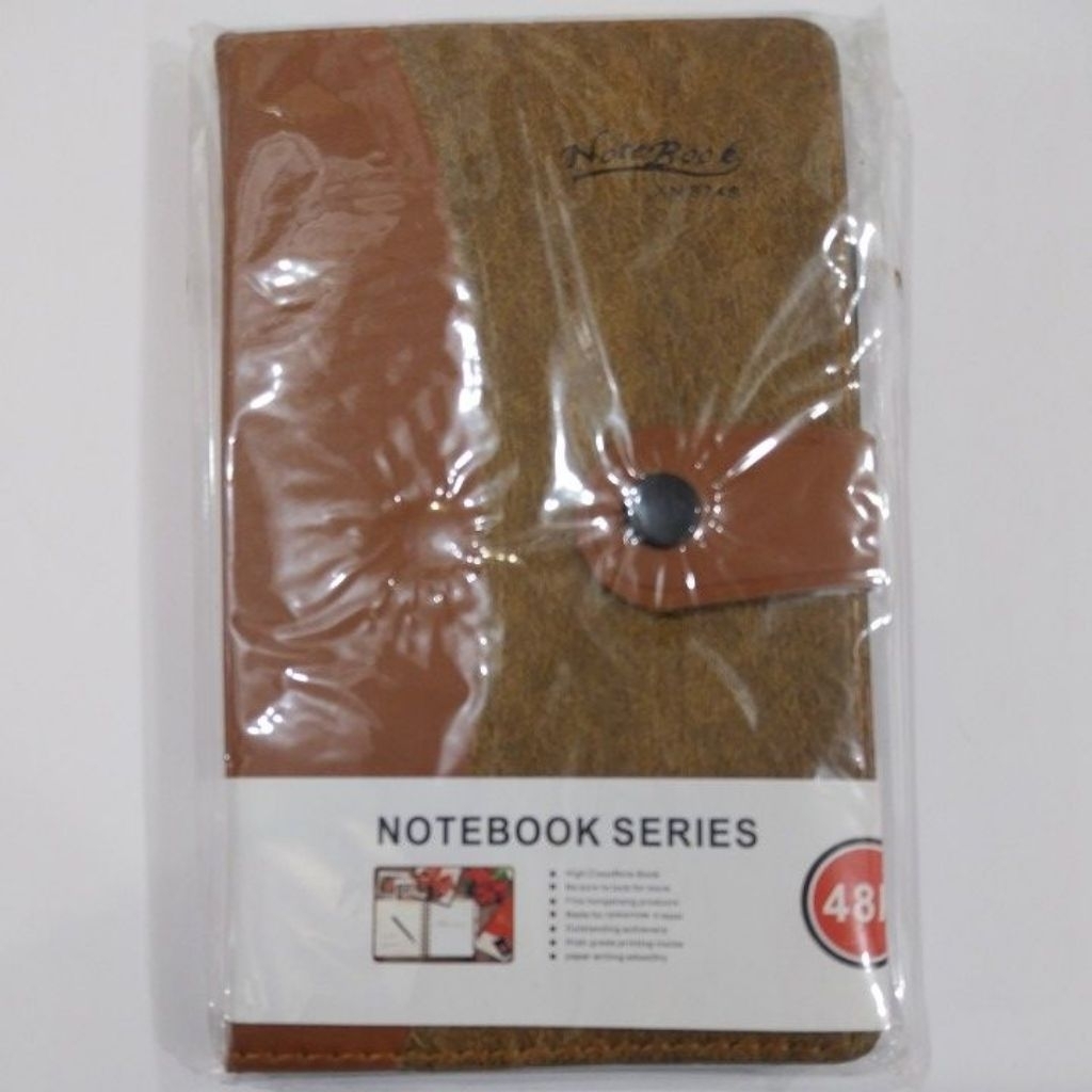 Buku agenda berkancing