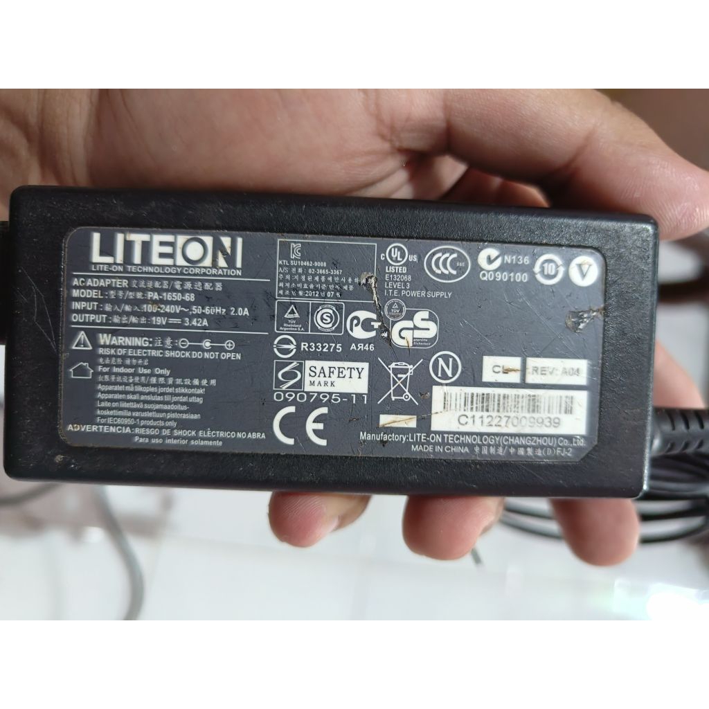 charger laptop bekas