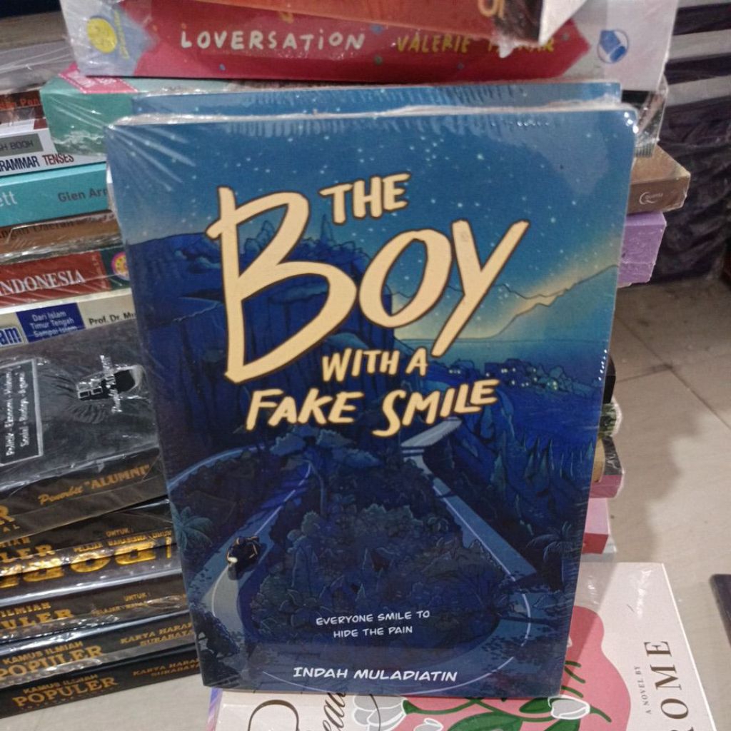 original buku novel the boy with a fake smile
