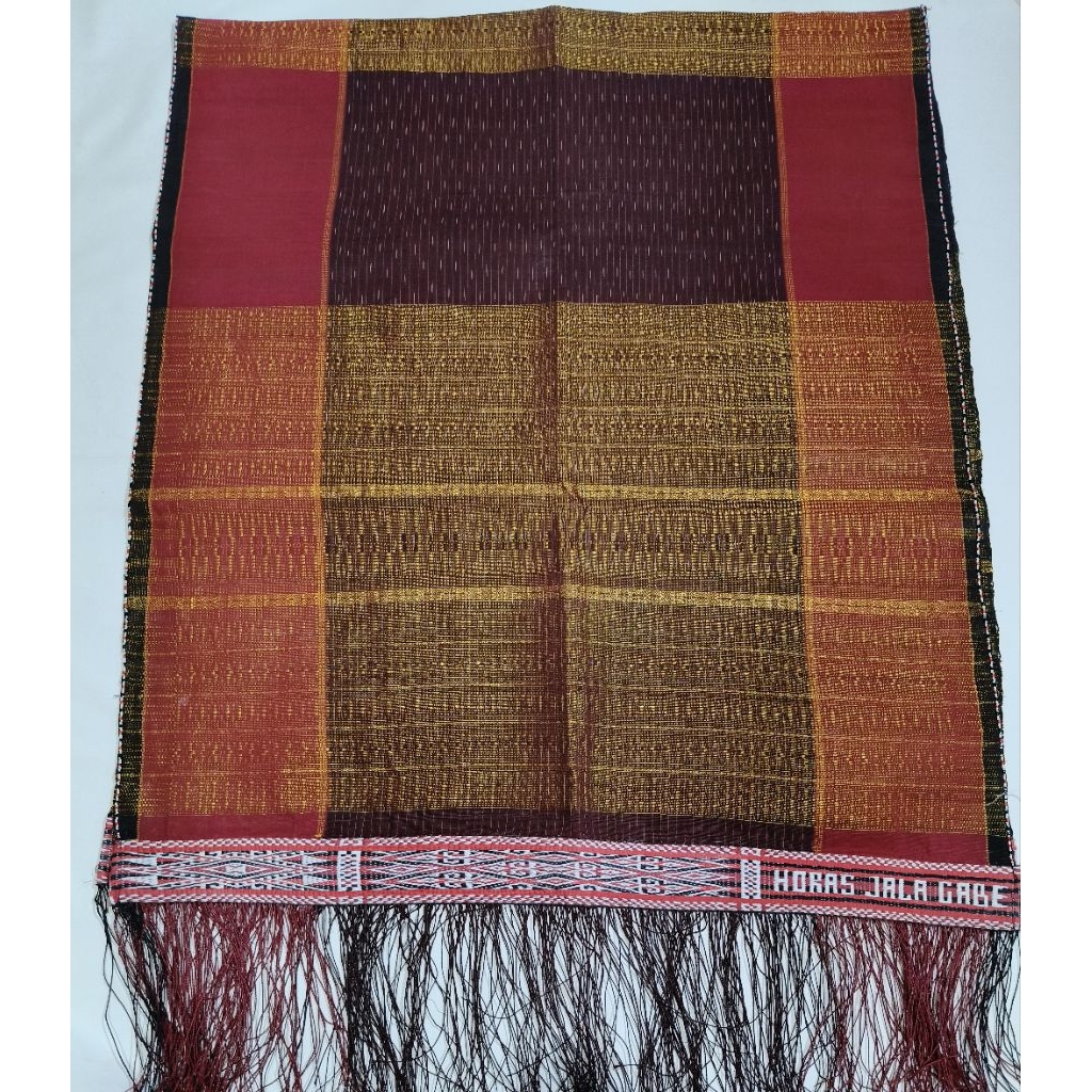 Ulos ragi hotang tenun tangan pakaian adat Batak toba