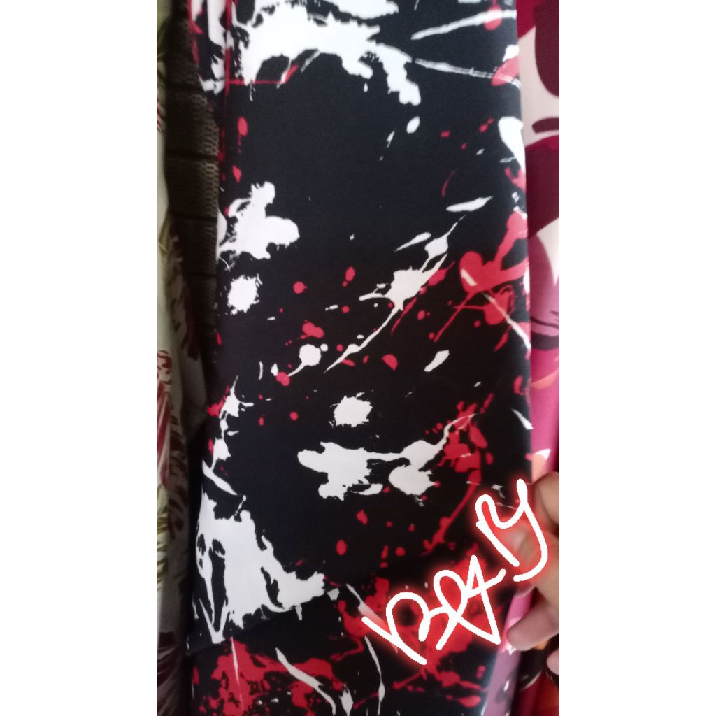 kain monalisa motif abstrak