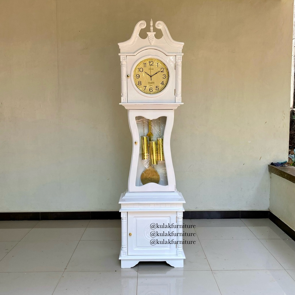 lemari jam hias kayu jati / lemari jam hias putih kayu jati / lemari jam hias klasik kayu jati / alm