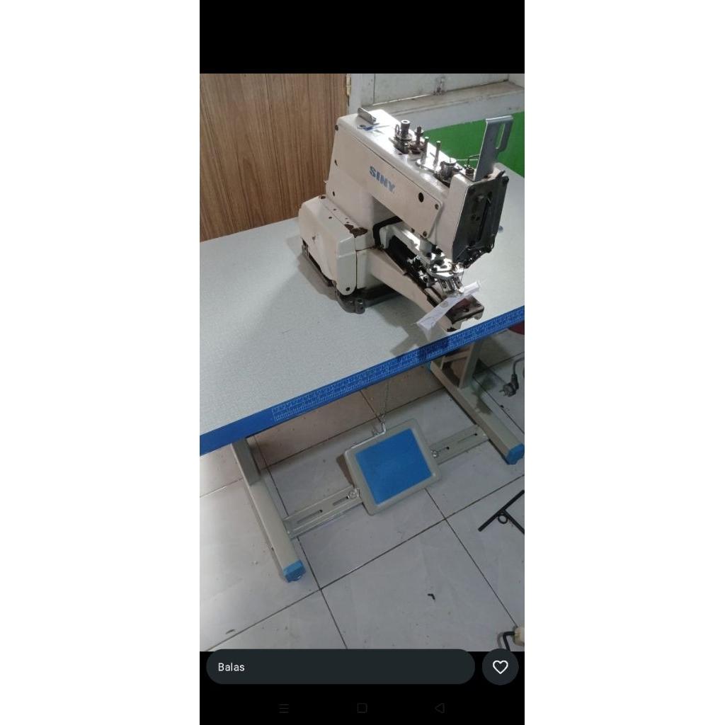 mesin pasang kancing