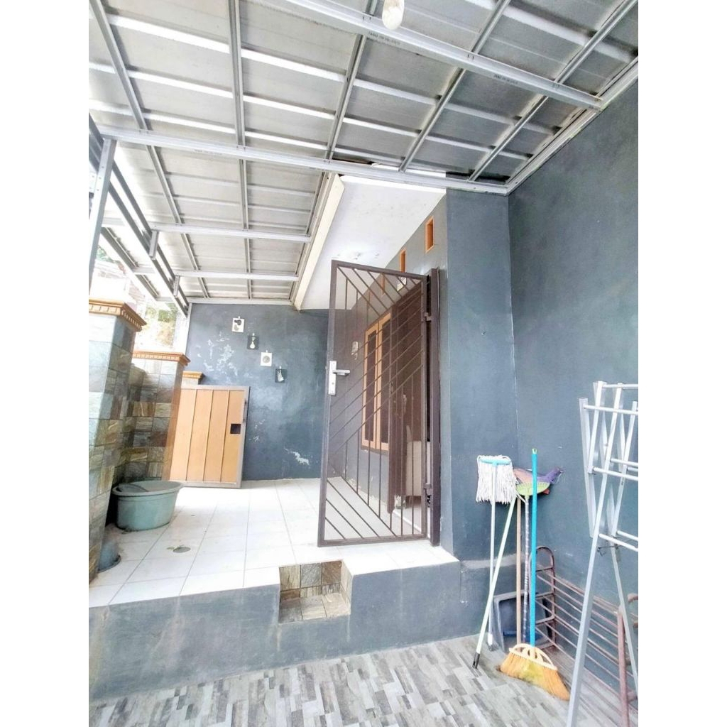 Kanopi baja ringan atap spandek pasir terpasang