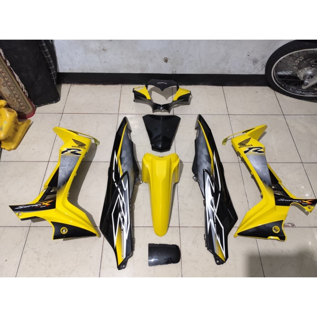 Body set supra 125 batman tahun 2008 warna kuning hitam