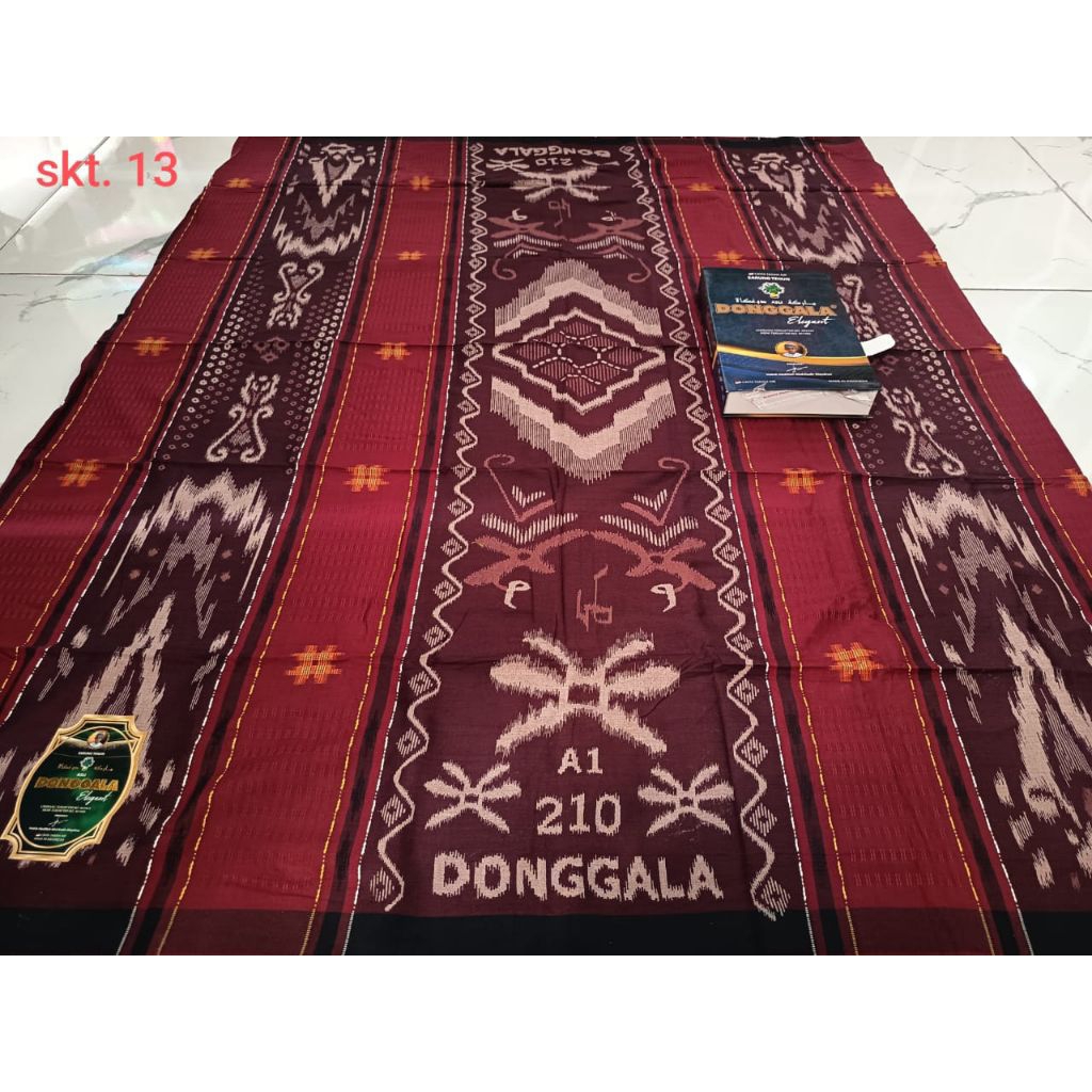 *Donggala A1 210**Mutif SKT/ Songket sebagian**Bahan TR Rayon adem dan tebal**Kode SKT*