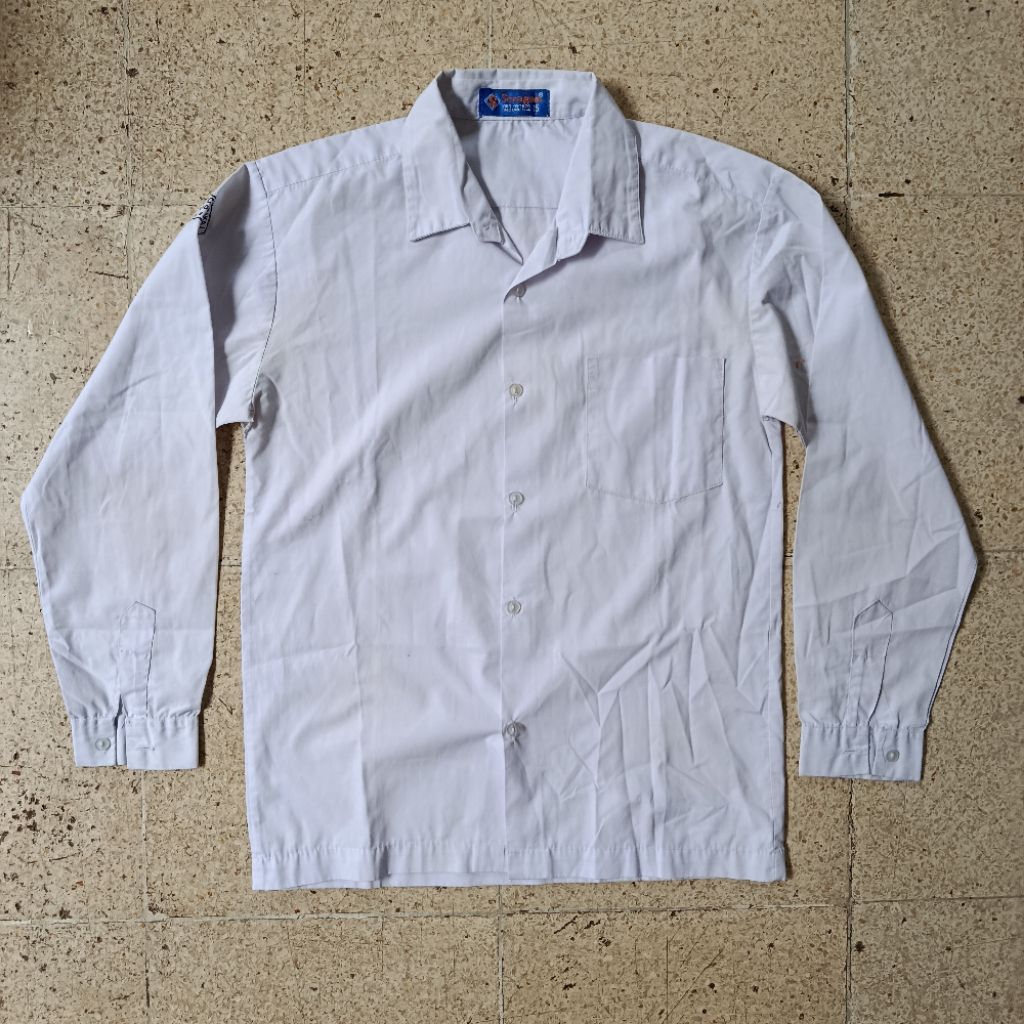 PL baju sekolah putih merk seragam / strike 70