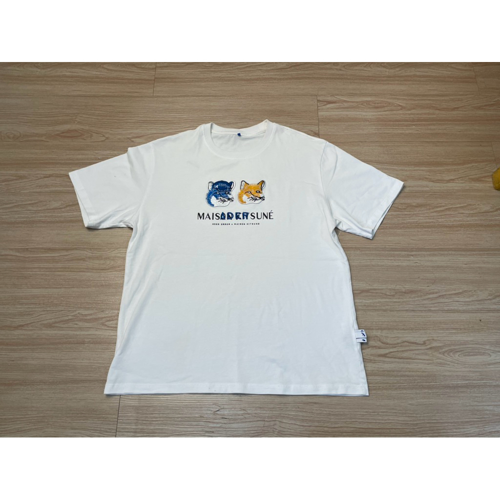 kaos merk maison kitsune X ader error