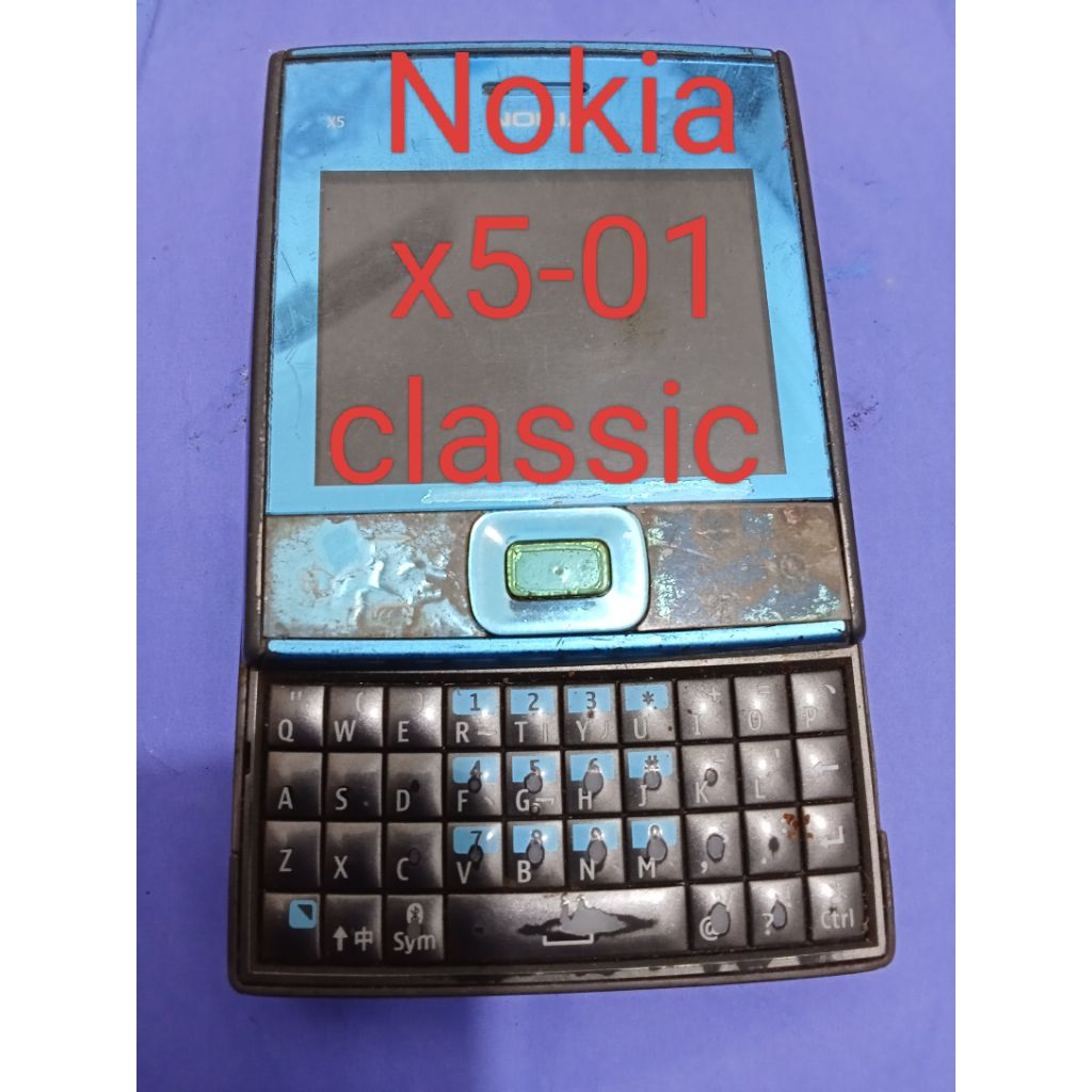 Nokia x5-01 classic Buat bahan mesin cuman getar aja gak tampil