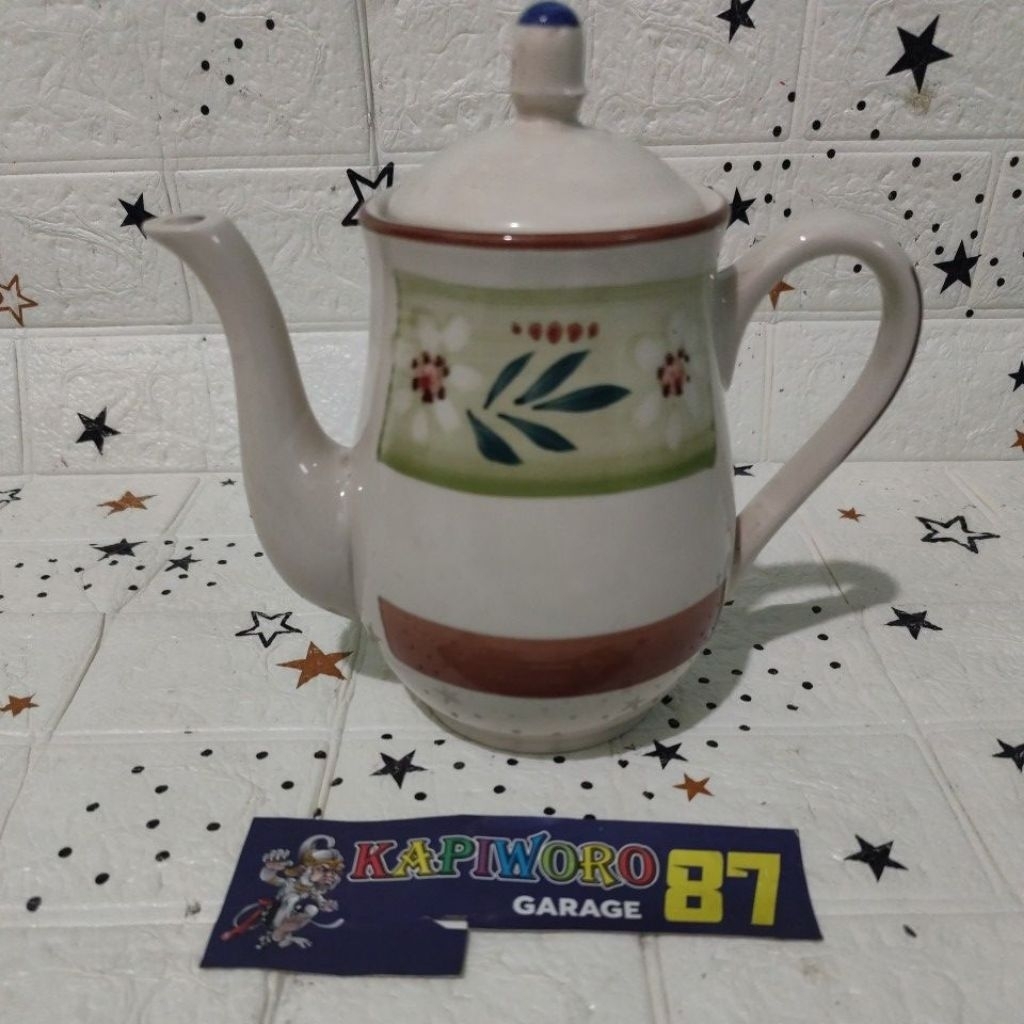 teko keramik motif dedaunan