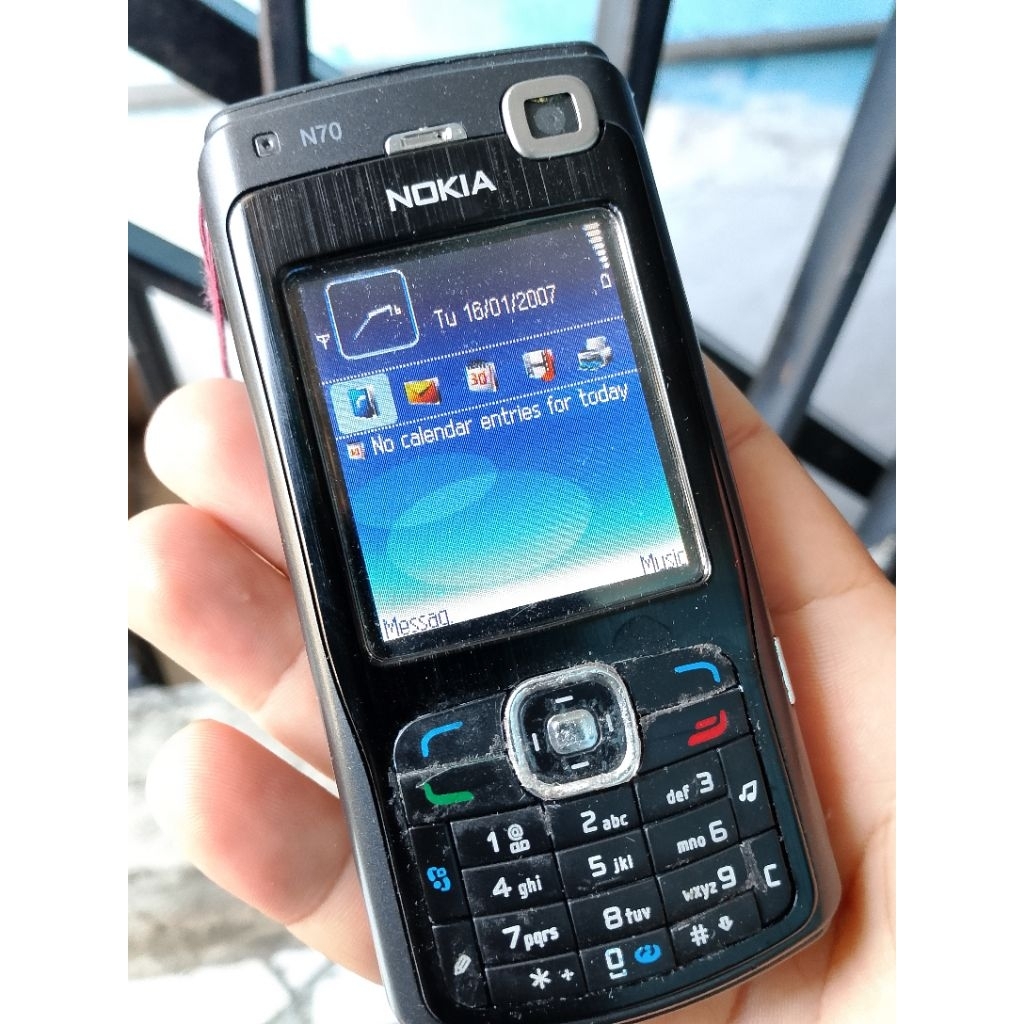 Nokia N70 hp cas bonus memory 1GB sama baterai & jam digital