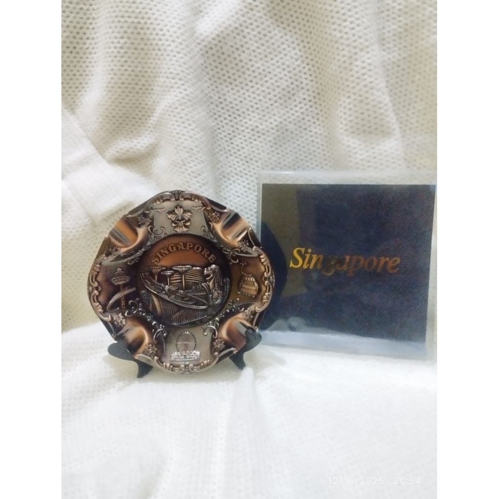 Figura hiasan asbak singapura