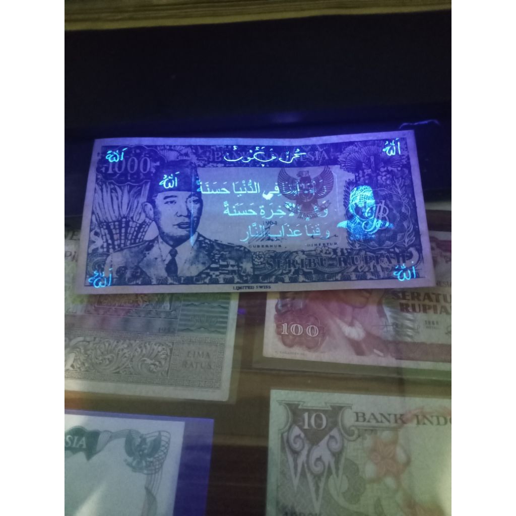 uang 1000 soekarno 1964 biru uka2 garuda kanan