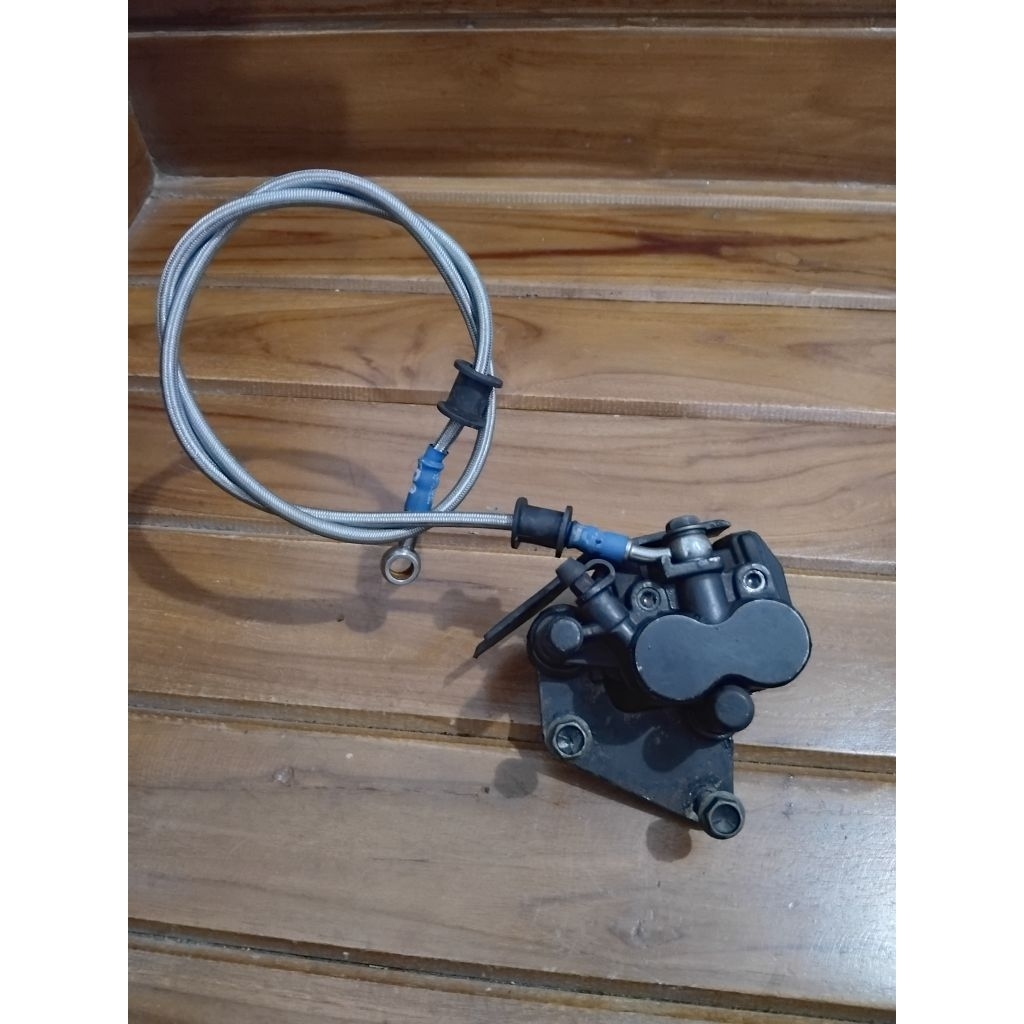 kaliper rem depan suzuki thunder 125/rgr 150 original copotan