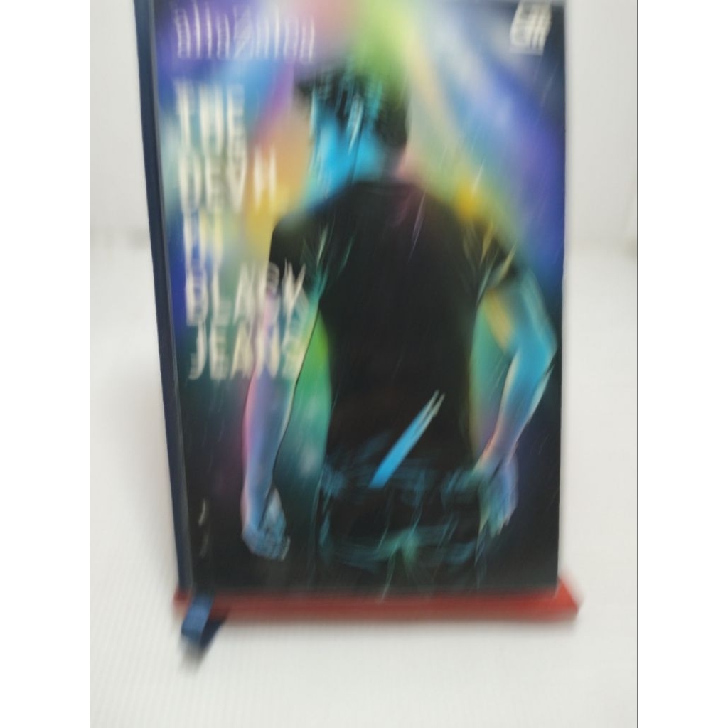 Novel The Devil in Black Jeans oleh Alia Zalea