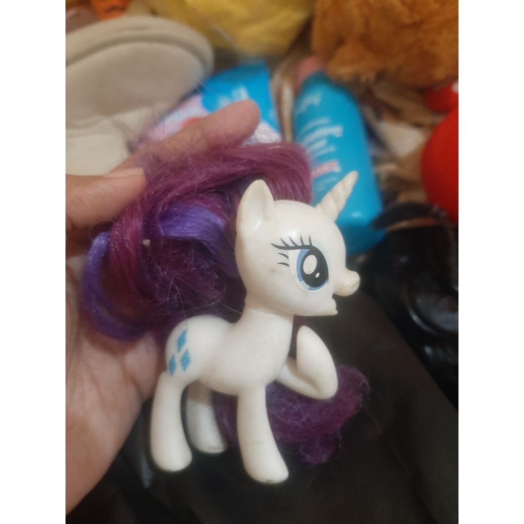 figur kuda pony rambut ungu