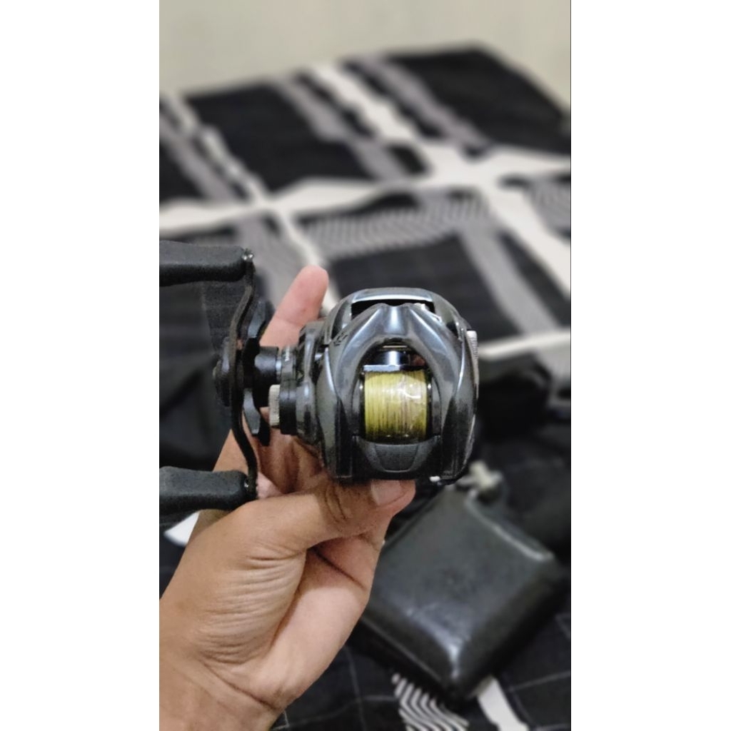 reel LIKE NEW BC  DAIWA TATULA SV TW 100HL