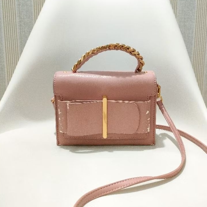 (PRELOVED) TAS ORIGINAL CHARLES AND KEITH RIBBON MINI DUSTY PINK SLING BAG