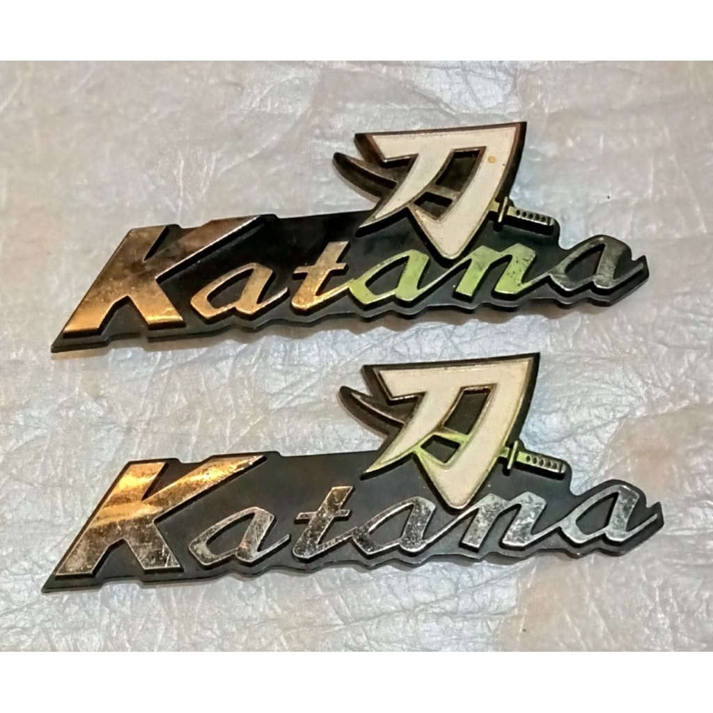 Emblem Box Cover Side Samping Aki Suzuki TRS TRZ Katana Original