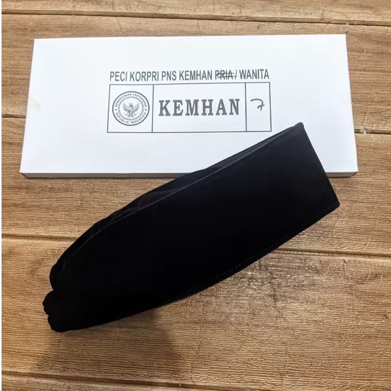 PECI TUTUP KEPALA PNS KEMHAN RI.