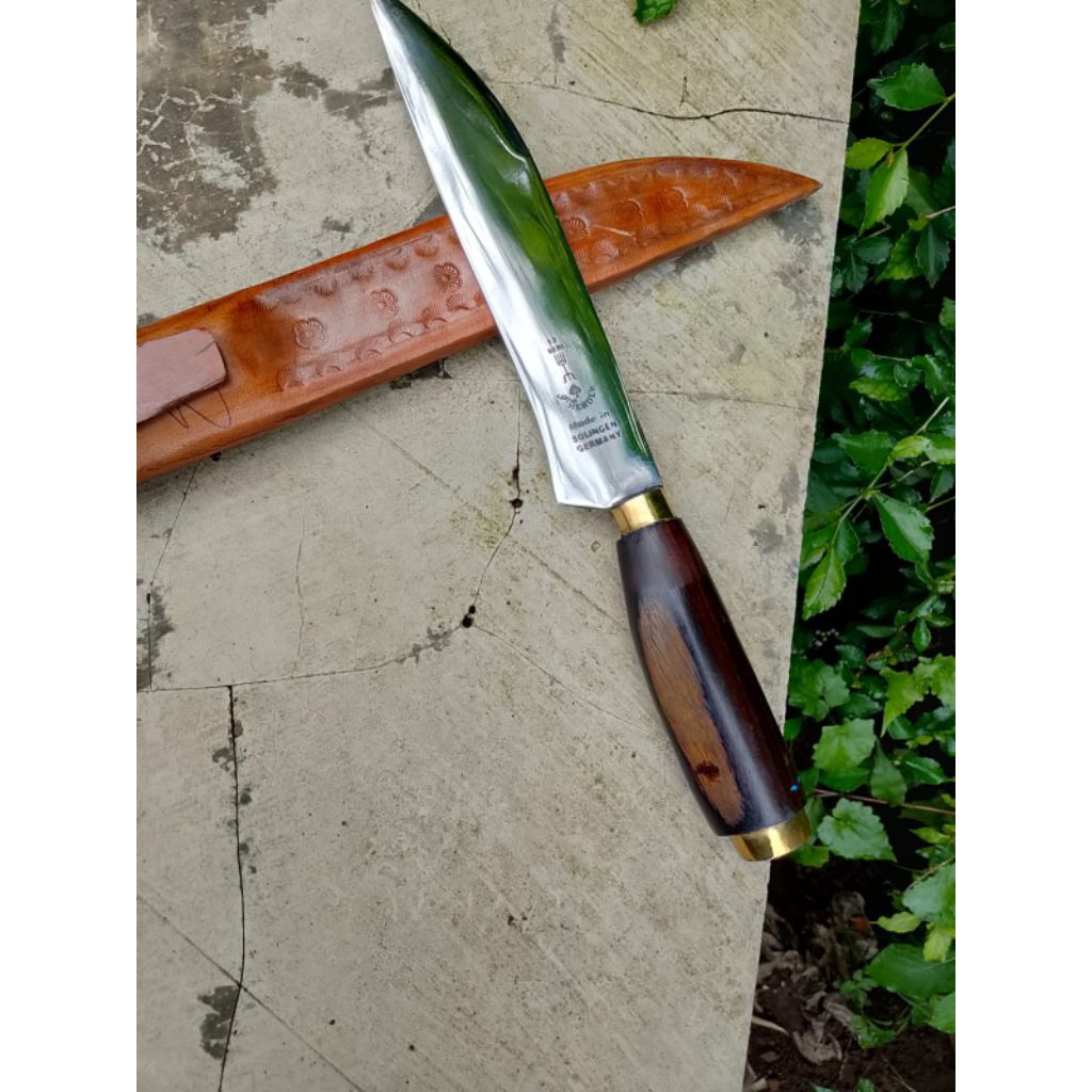 pisau dapur cap garpu. bilah ber motif.