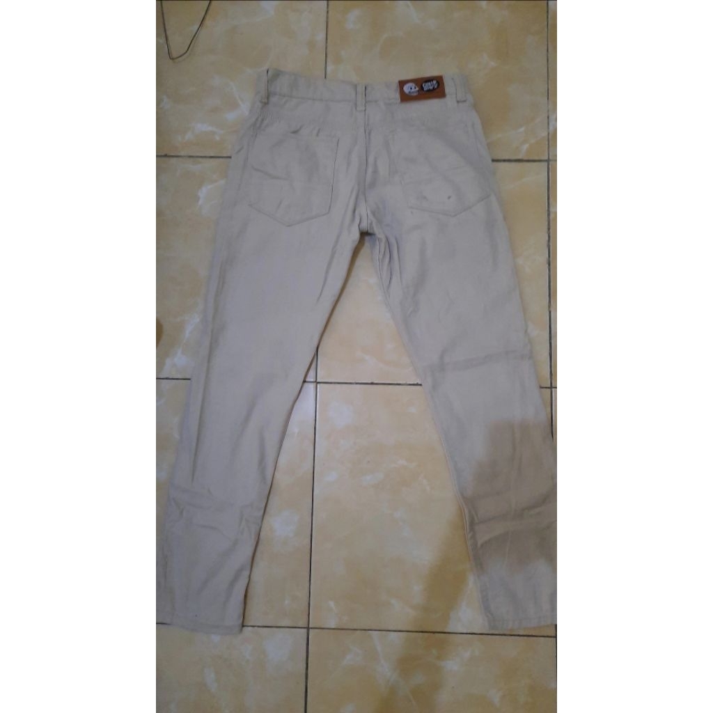 preloved jeans pria cream