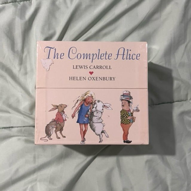 The Complete Alice Alice’s Adventures in Wonderland , Alice Through The Looking-Glass Lewis carol He