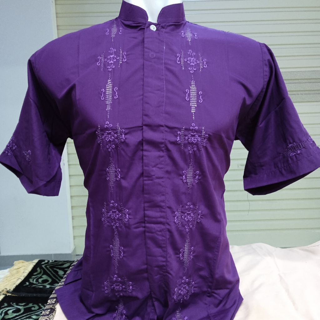 Baju Muslim Pria Koko Terawang Taluak Balango Lengan Pendek Khas Bukittinggi Agam Warna Ungu Terong