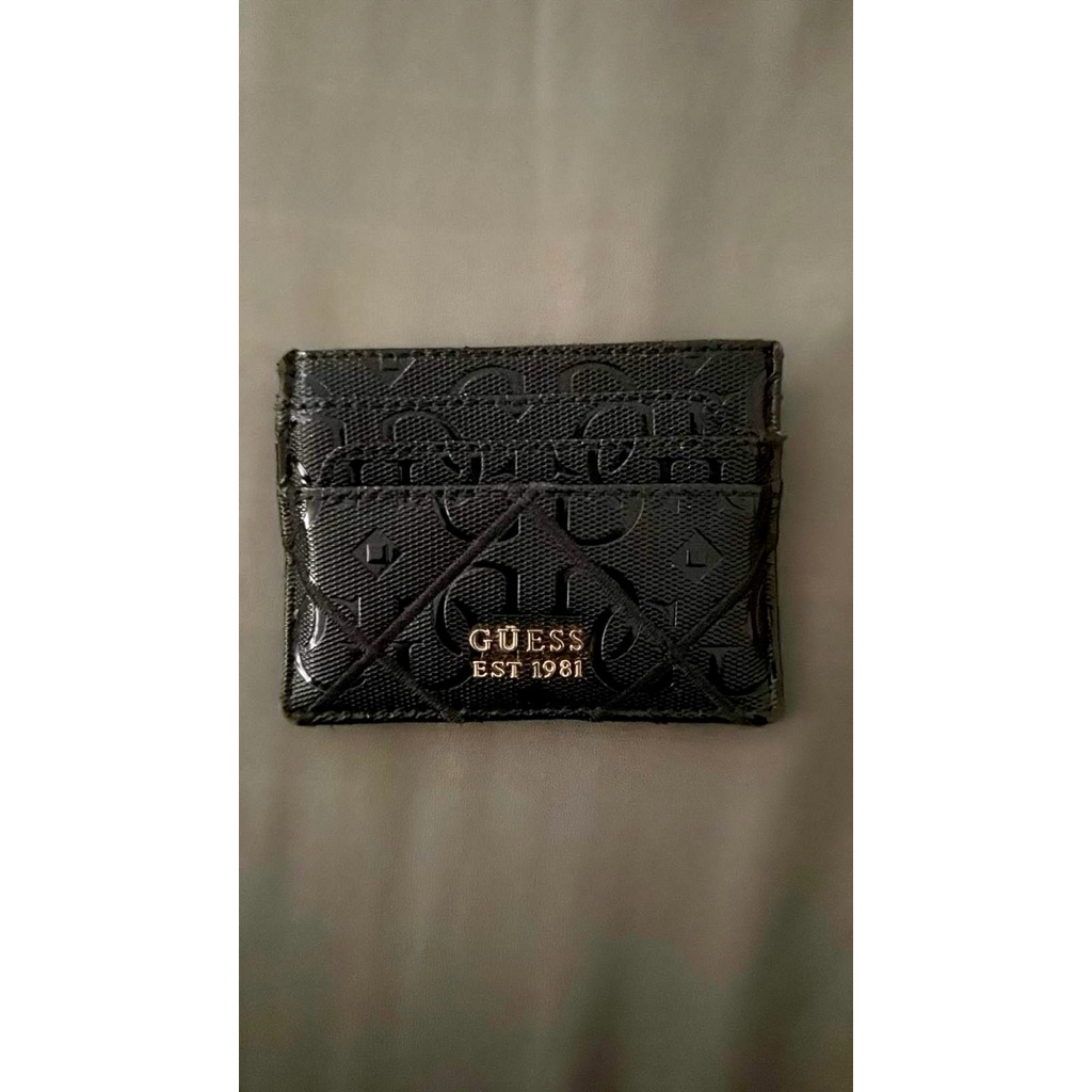 Card Holder Guess
