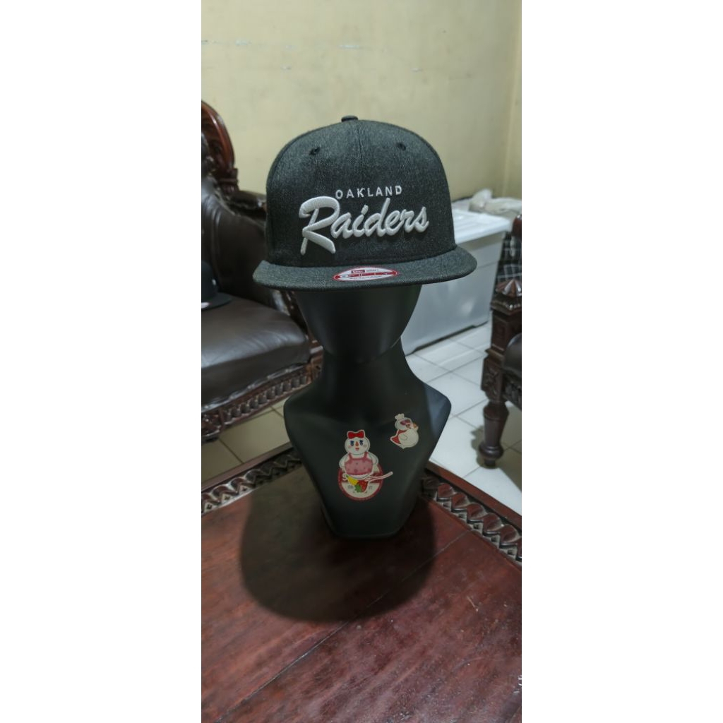 TOPI SNAPBACK RAIDERS NEW ERA ORIGINAL SCRIPT small LOGO