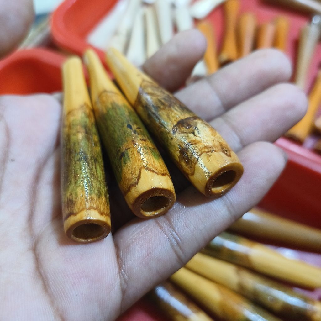 Once pipa kayu kopi adem saat dipakai