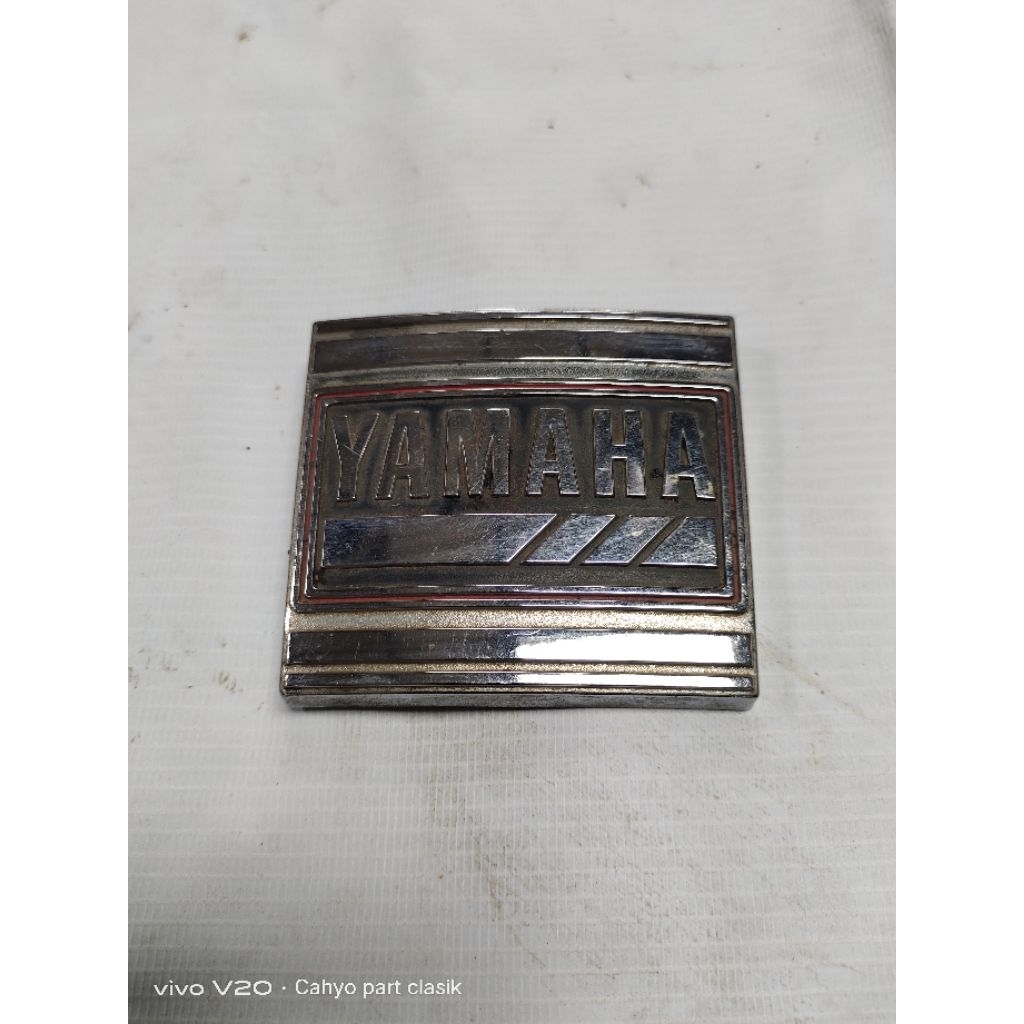 Emblem dasi Yamaha alfa