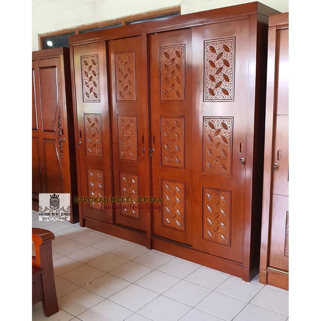 lemari pakaian pintu 4 sliding geser minimalis jati ukiran daun
