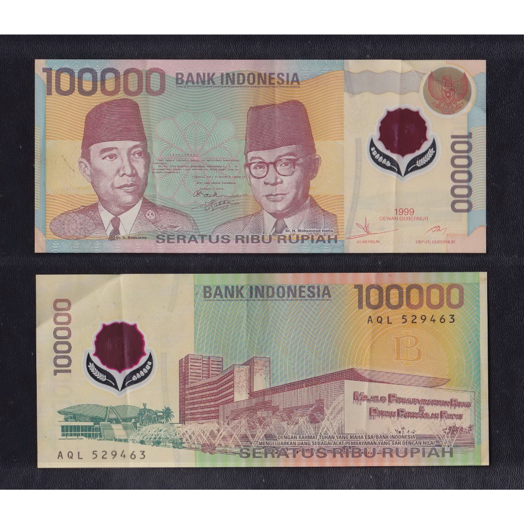 Uang kuno polymer 100000 Rupiah tahun 1999 .