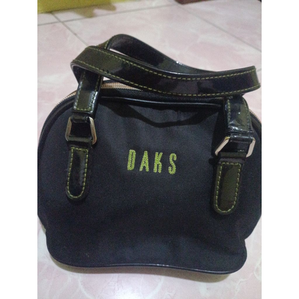 tas brand Daks original