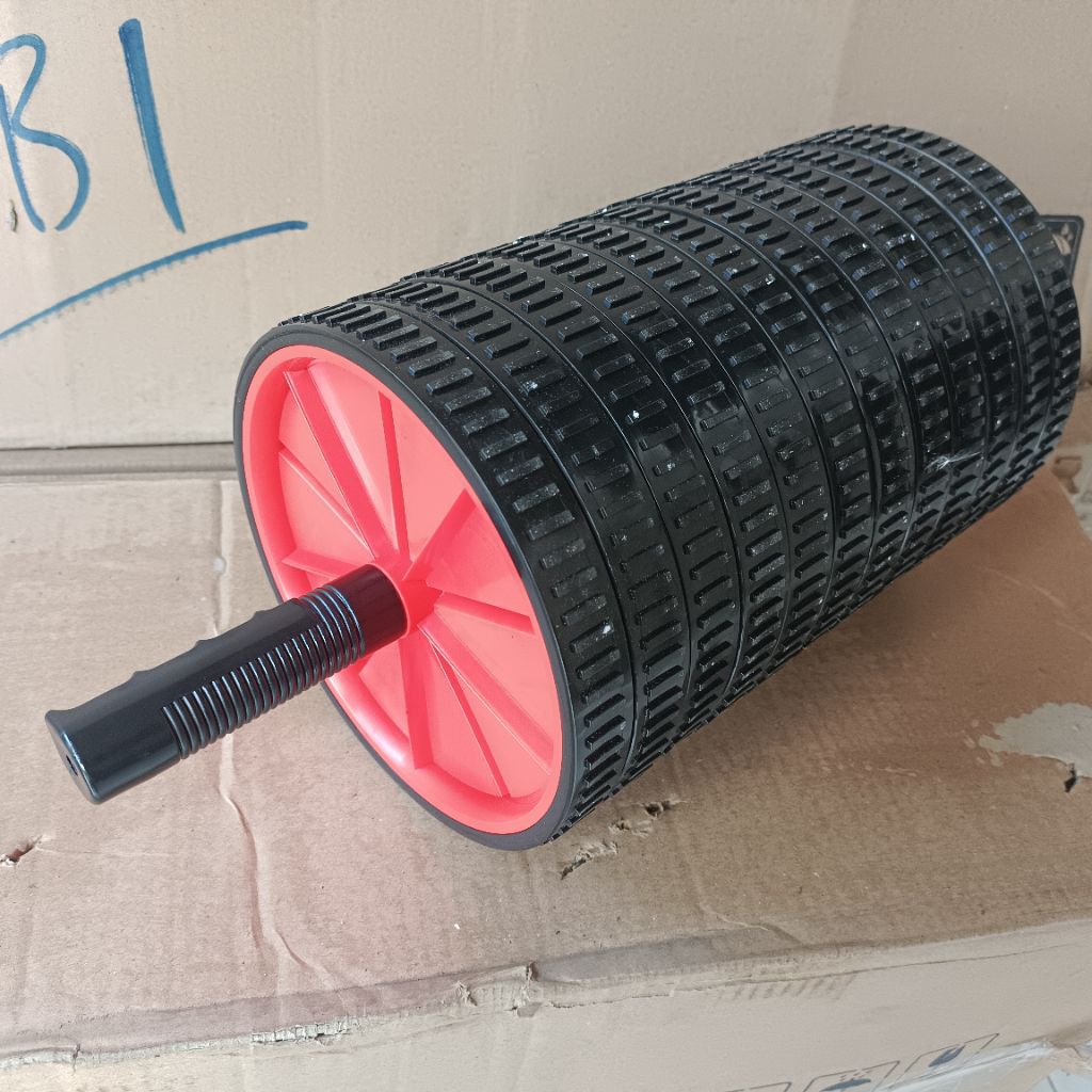 alat olah raga slid wheel untuk otot perut.