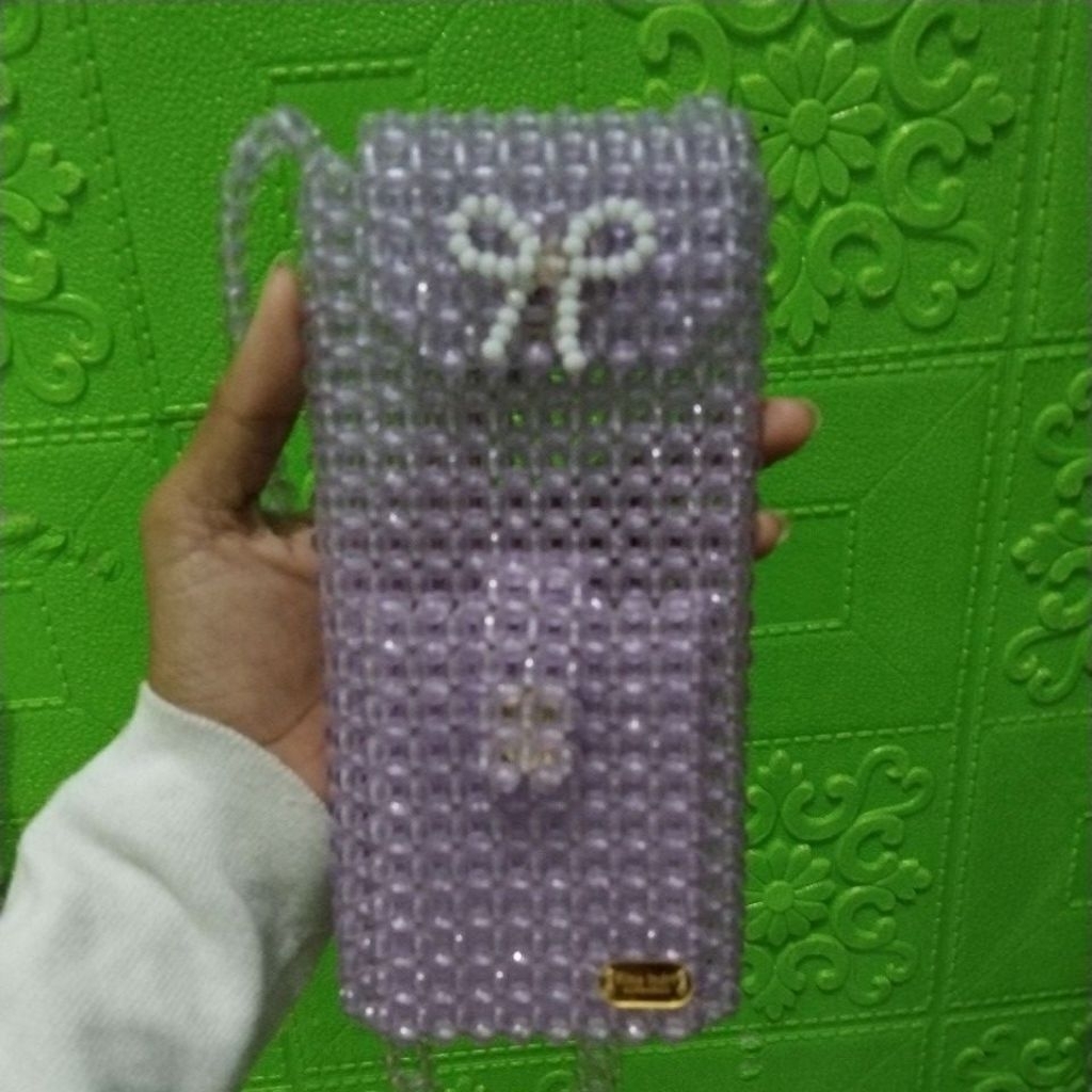 tas hp manik manik