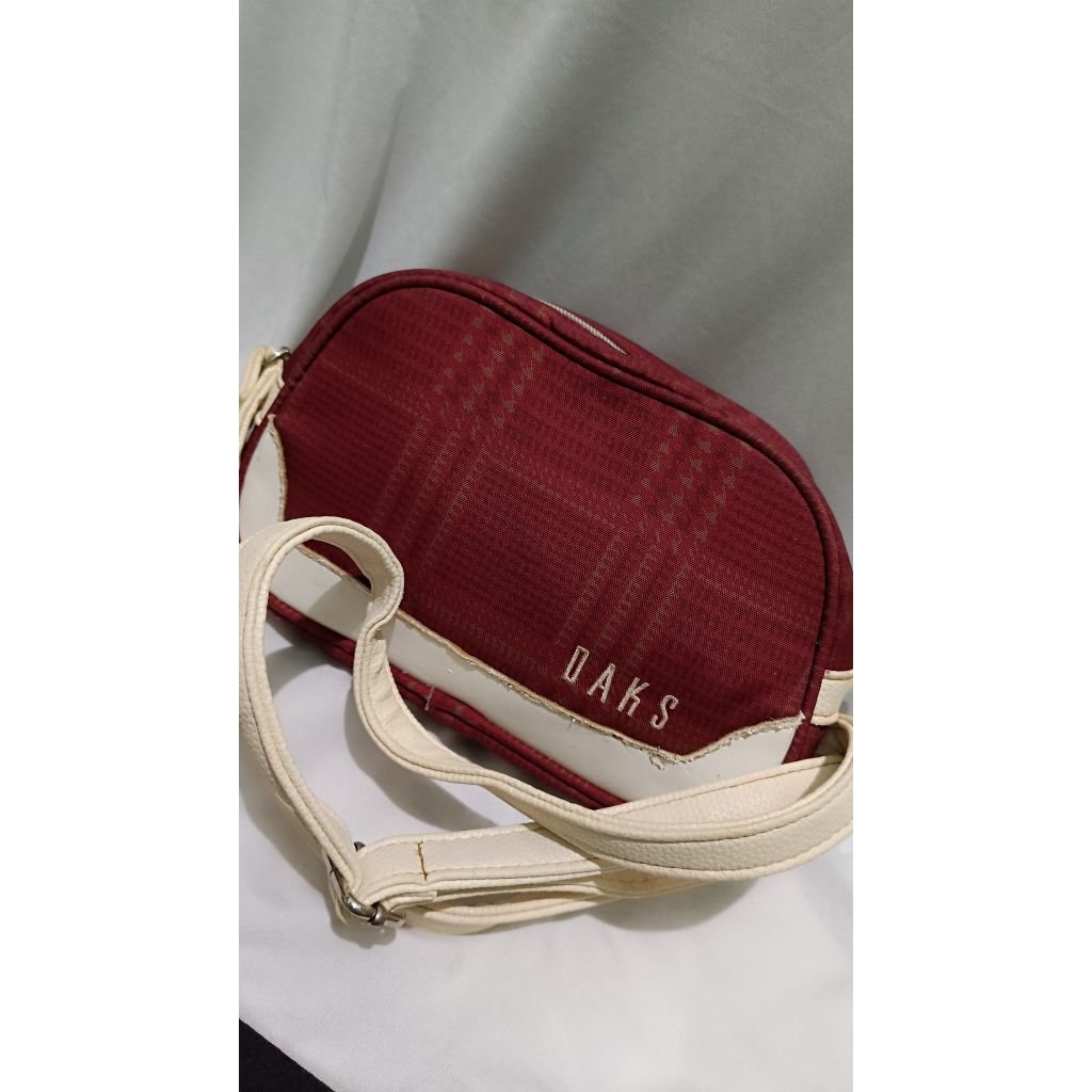pl sling wanita daks