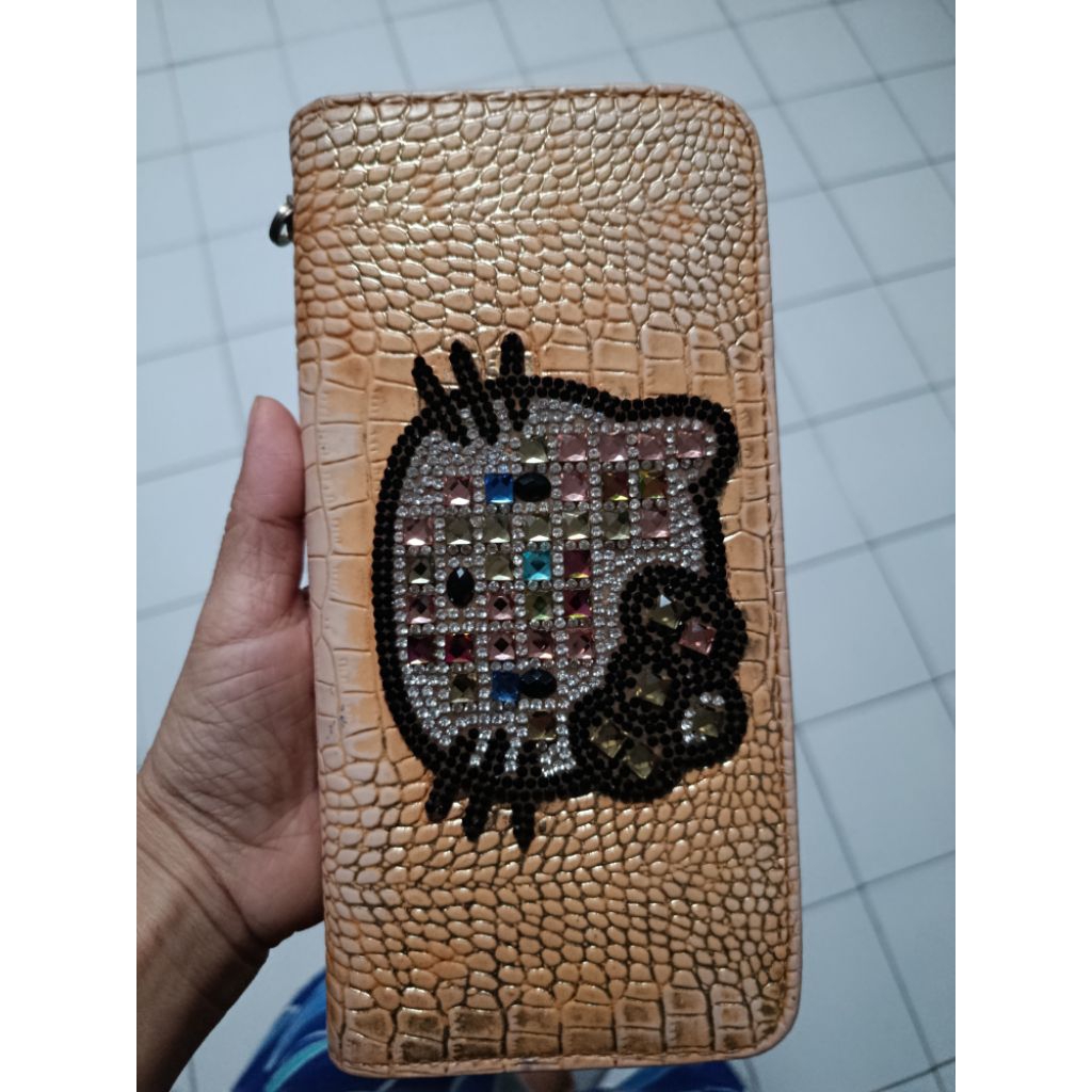 Preloved dompet warna emas