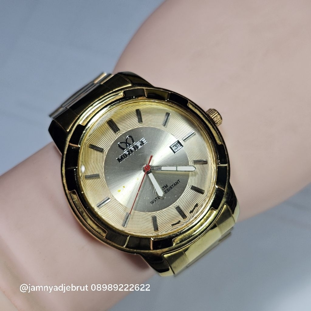 Jam Mirage 7390BRP Gold Bekas