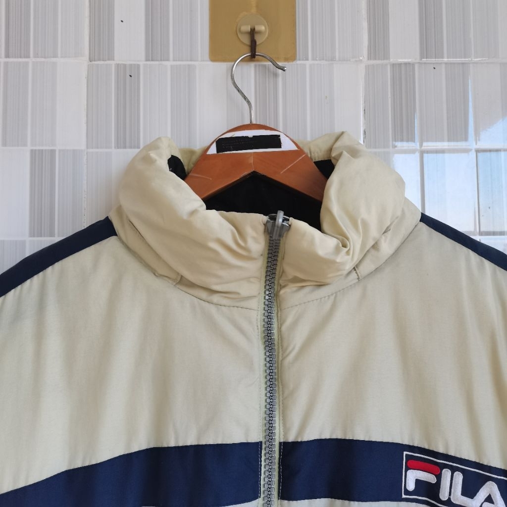 1089.  JAKET BULANG FILA SIZE XXL  PRELOVED